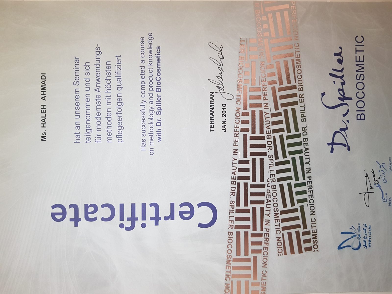 Award certificate presented to Haleh Ahmadi